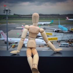 View of toy on airplane against sky