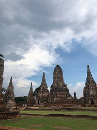 Old temple against cloudy sky