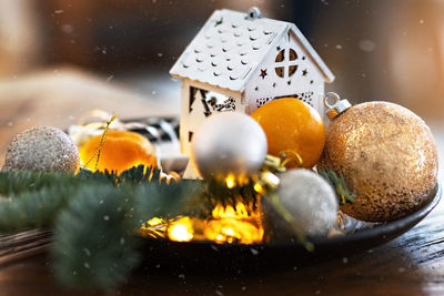 Close-up of christmas decorations on table