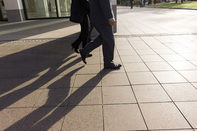 Woman walking on road