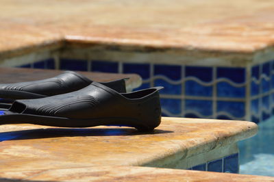 Close-up of shoes on table