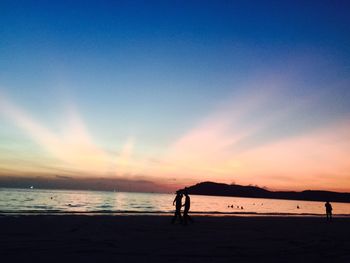 Scenic view of sea at sunset