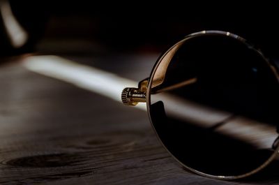 Close-up of sunglasses on table