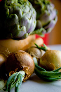 Close-up of artichoke on table