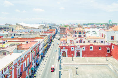 High angle view of street amidst buildings in city