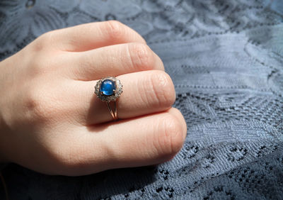 Close-up of woman hand holding ring