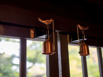 Close-up of doorbell hanging