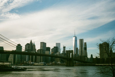 City skyline against cloudy sky