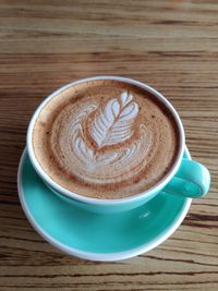 Close-up of coffee cup on table