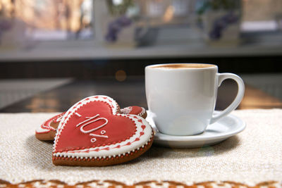 Close-up of coffee cup on table