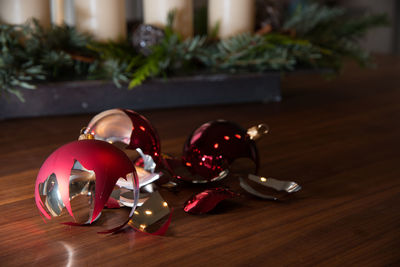 Close-up of broken baubles on table