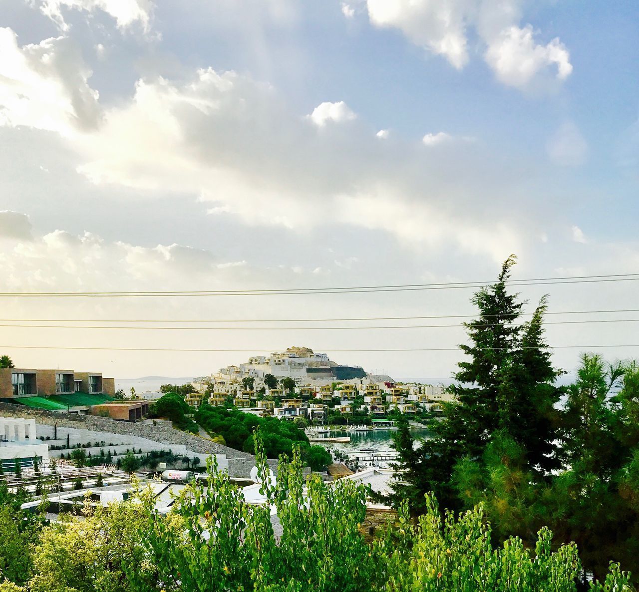 PANORAMIC VIEW OF CITY AGAINST SKY