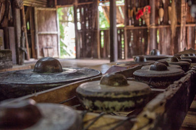 Close-up of old bowl on table