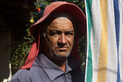 Portrait of man wearing hat