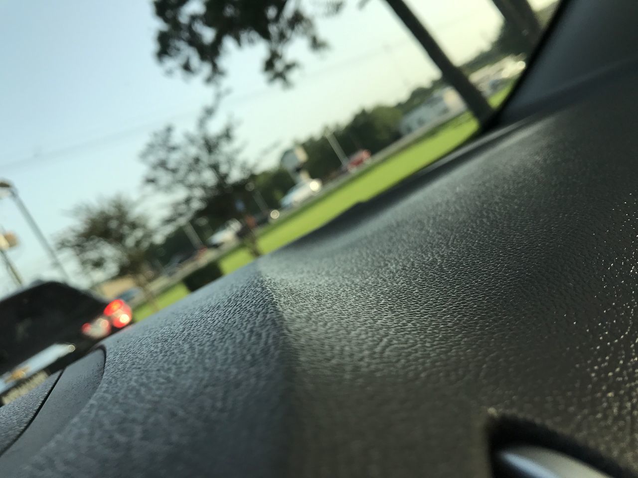 car, transportation, land vehicle, mode of transport, vehicle interior, road, car interior, selective focus, street, day, no people, outdoors, close-up, tree, city, sky