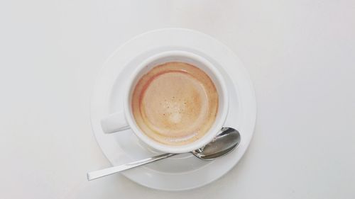 Directly above shot of coffee cup on table