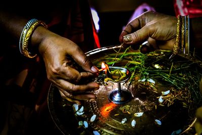 Midsection of man preparing food