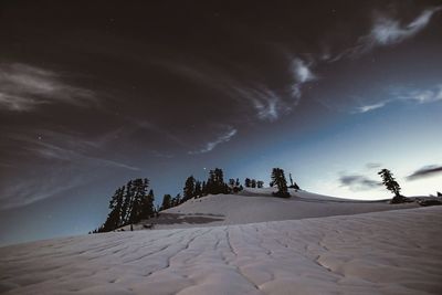 Scenic view of landscape against sky at night