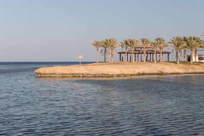 Scenic view of sea against clear sky