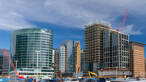 Modern buildings against sky in city