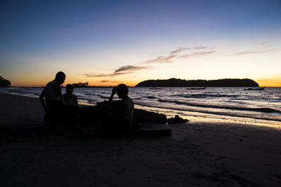 Scenic view of sea at sunset