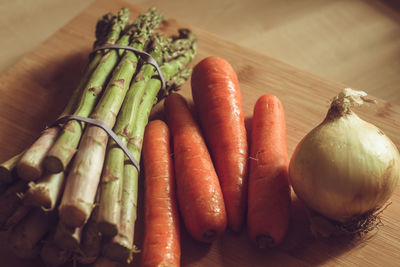 High angle view of vegetables on cutting board