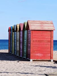 Built structure on beach against sky