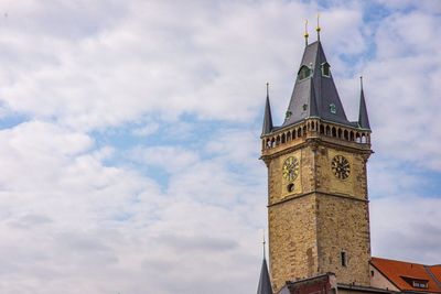 Low angle view of clock tower against sky