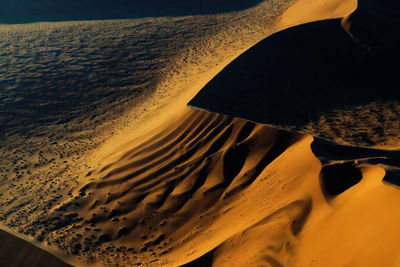 High angle view of sand dunes at beach