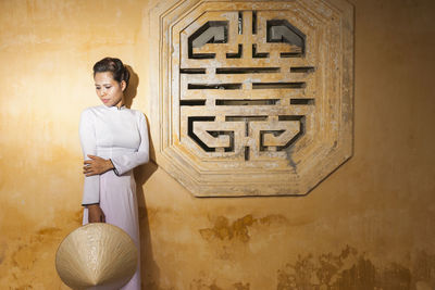 Beautiful woman exploring the imperial palace in hue / vietnam