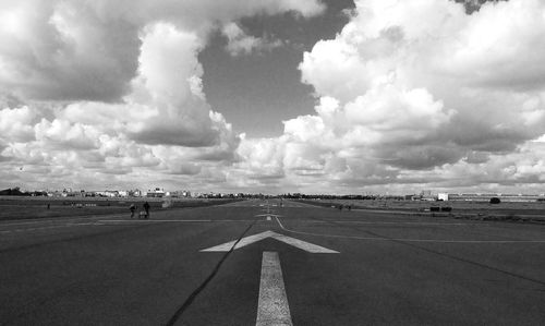 Road against cloudy sky