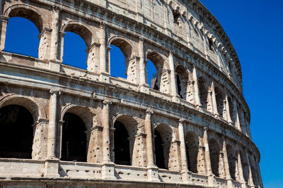 Detail of the famous colosseum or coliseum also known as the flavian amphitheatre in rome
