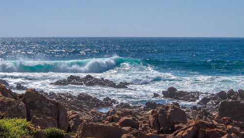 Scenic view of sea against clear sky