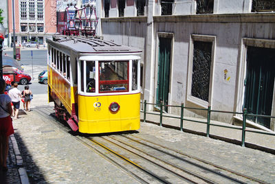 View of railroad tracks by building