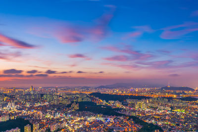 High angle view of cityscape against sky during sunset