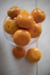 Orange on table. juicy fruit. vitamin c in fruits. details of food in kitchen. 