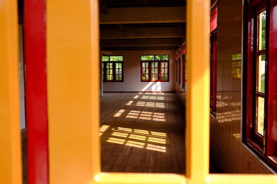 Empty room seen through window