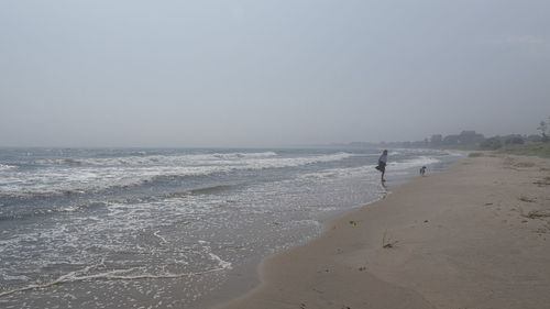 Scenic view of sea against clear sky