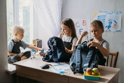 Back to school, schoolchildren hygiene, safety precautions after coronavirus. 