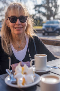 Portrait of woman having breakfast