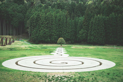 High angle view of man standing by fountain