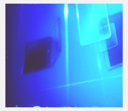 transfer print, blue, auto post production filter, illuminated, indoors, light - natural phenomenon, lighting equipment, glowing, wall - building feature, night, close-up, copy space, no people, electricity, built structure, technology, purple, wall, light, vignette