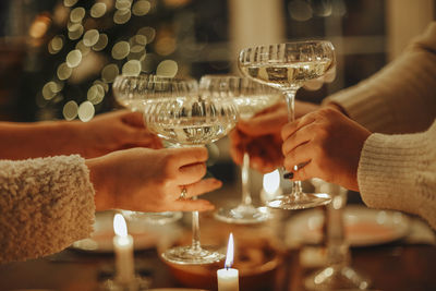 Cropped hand of woman holding wineglass