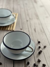 High angle view of coffee cup on table