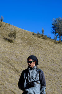 A male photographer on the mountain