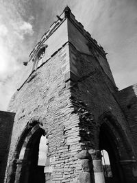 Low angle view of historic building against sky