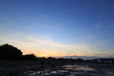 Scenic view of silhouette landscape against sky during sunset