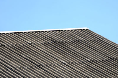 Low angle view of building against blue sky