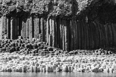 Panoramic shot of icicles on rock formation