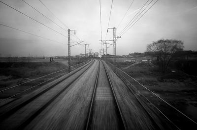 Railroad tracks against sky